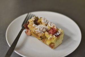 A slice of cake on a plate.